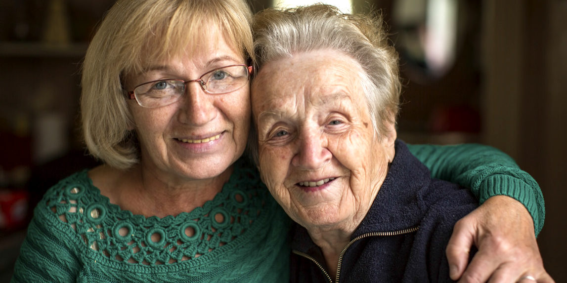 Portrait of an adult woman with his elderly mother.